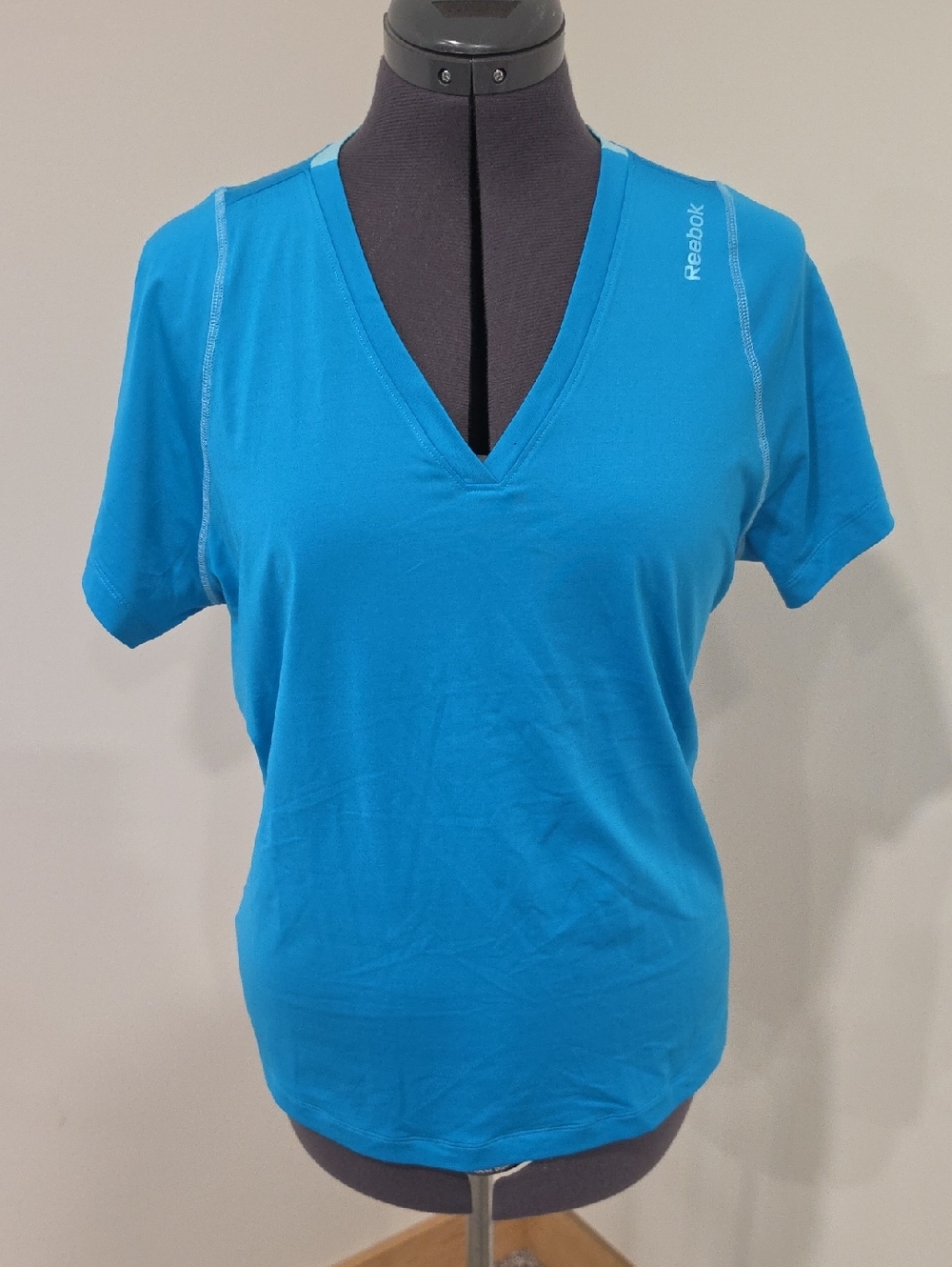 Reebok Teal V-Neck Short Sleeve Performance Tee